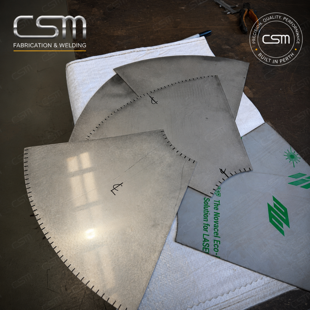 Stainless steel sheet metal cone development pieces prepared for forming and fabrication by CSM Fabrication & Welding in Perth.